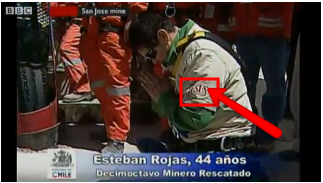 Rescued Chilean Miner Praying; Note T-Shirt Jesus Emblem