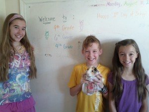 Avery, Addison and Toby all smiles on 1st day of school